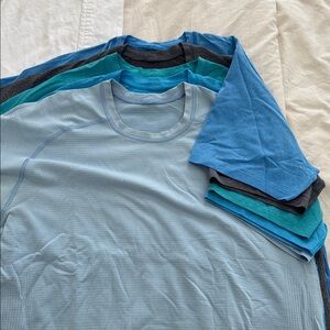 Multiple Lululemon men’s shortsleeved shirts.